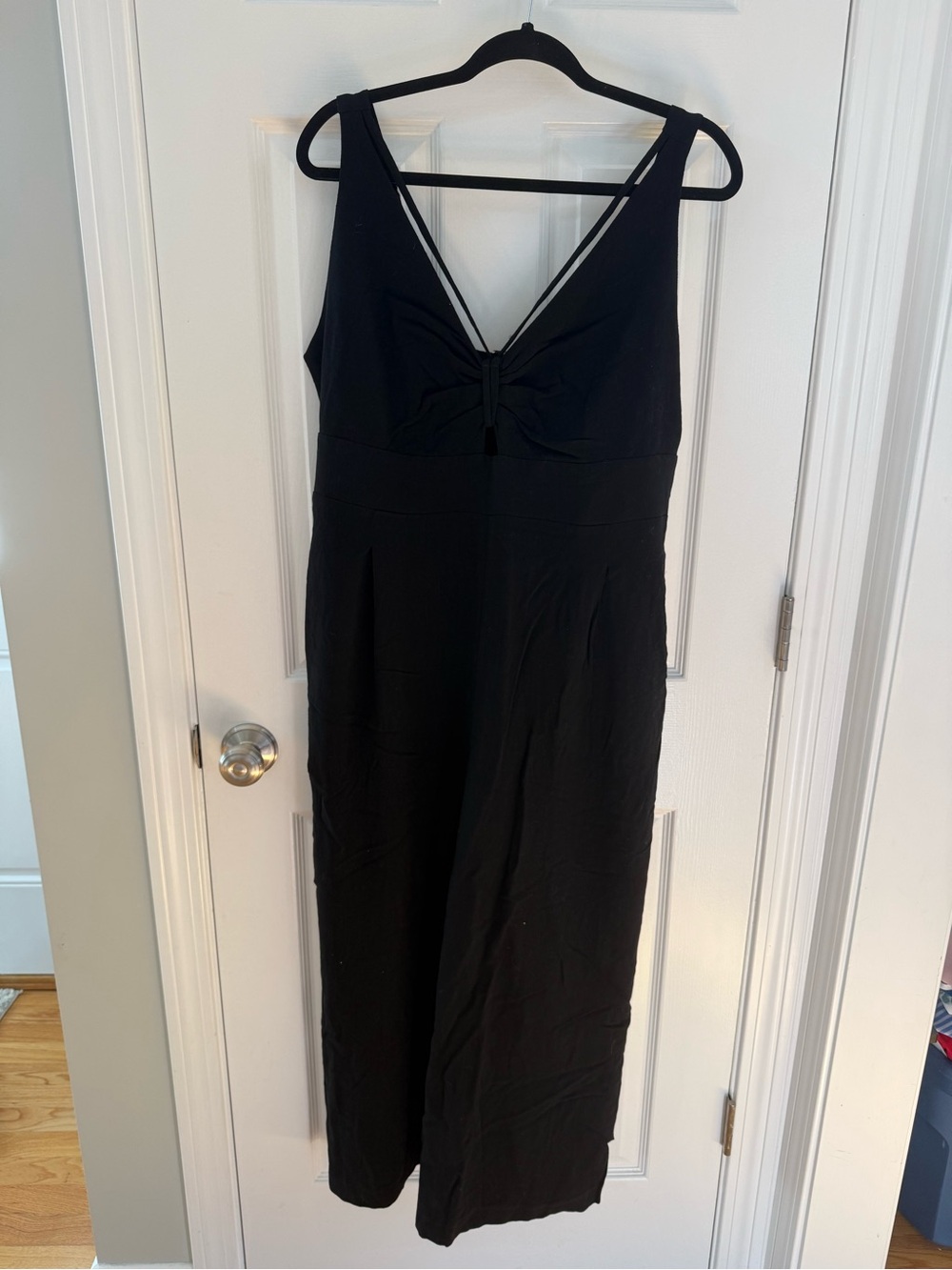 NWT Black Sleeveless V-Neck Jumpsuit with Knot Front and Cutout